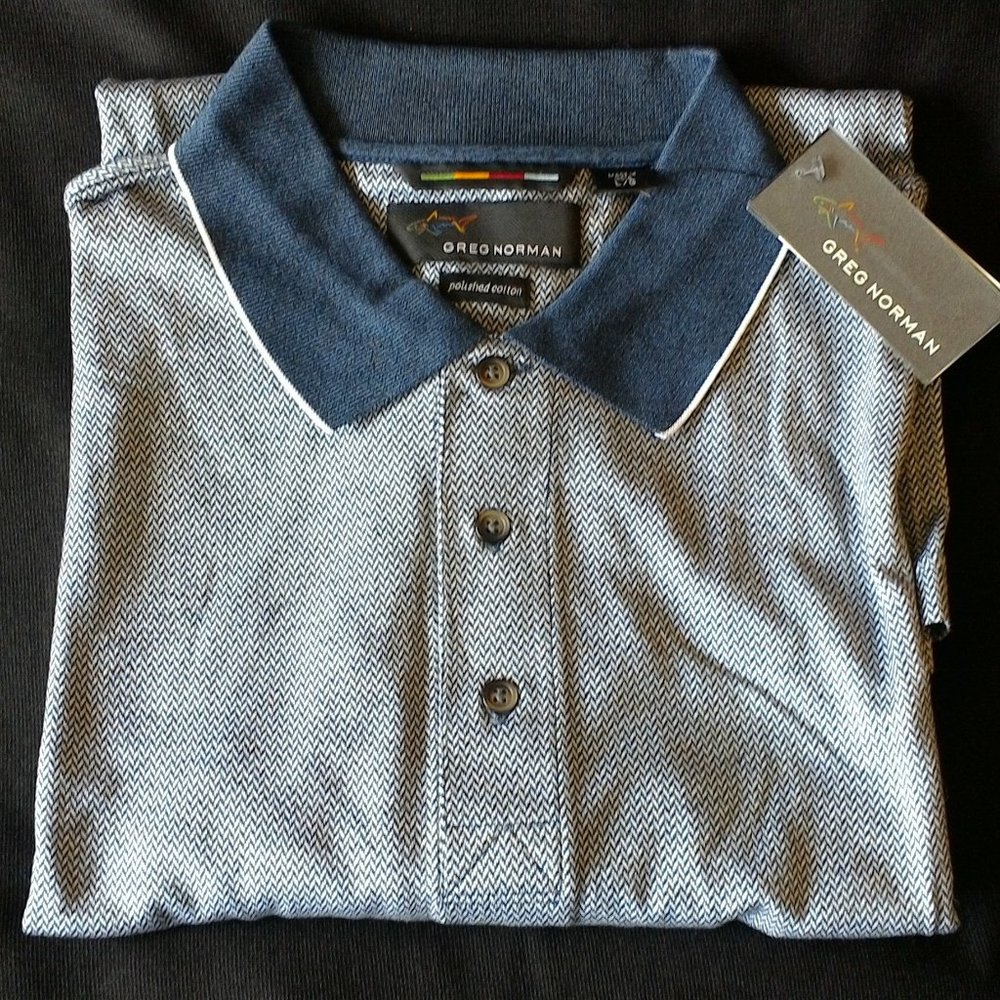 Greg Norman size L navy blue and white polo shirt